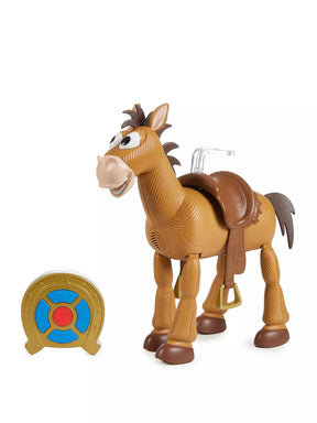 A toy horse with a brown saddle and tail, standing next to a small gold target with blue and red sections, on a plain white background.
