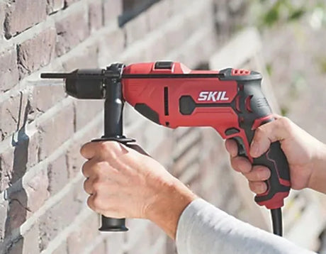 Skil HD1U6725AA 710W Electric Hammer Drill - Powerful 13mm Keyless Chuck with Variable Speed & Lock-On Trigger